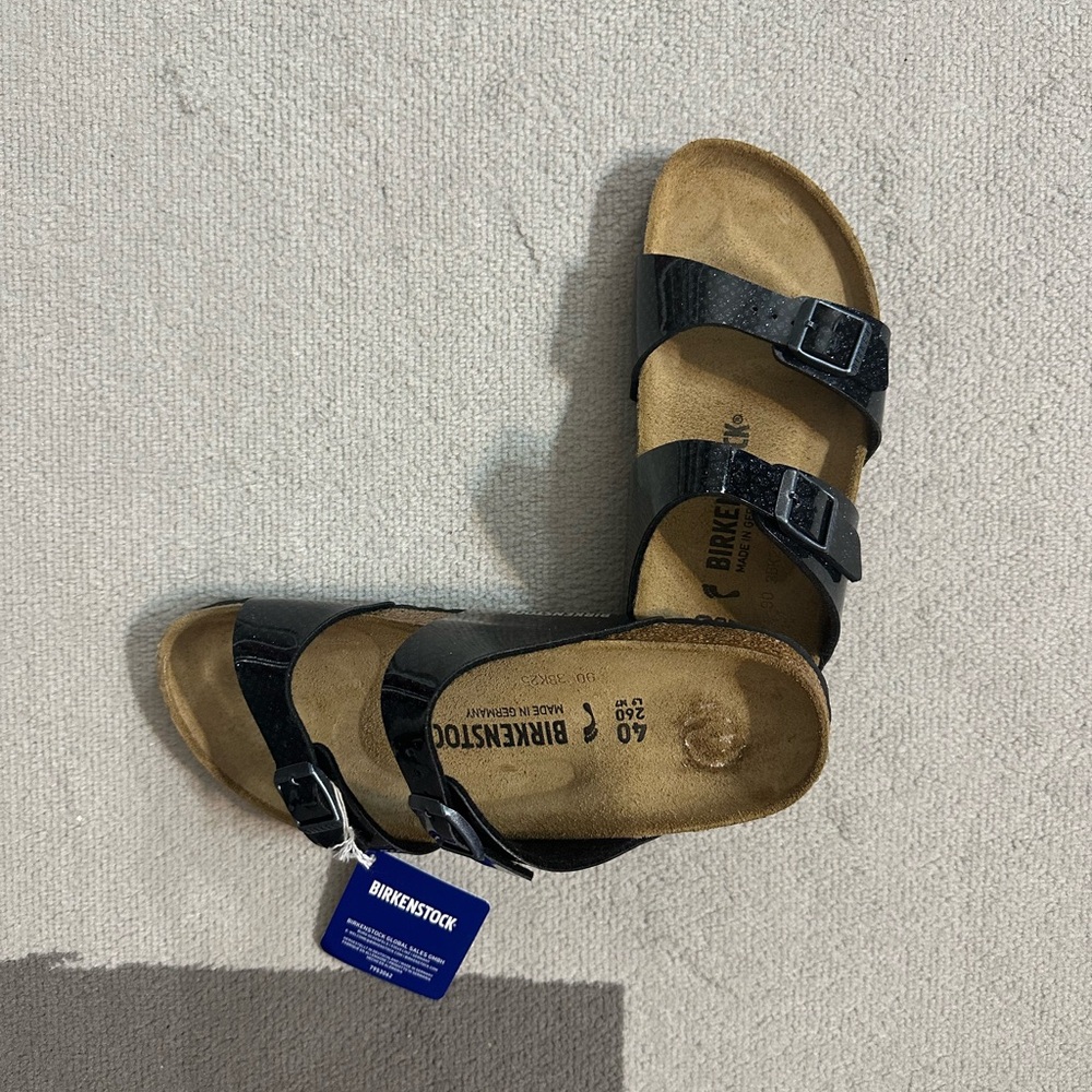Birkenstock Sydney women’s black magic snake size 40 (US 9-9.5) sandals